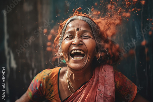Senior indian woman loudly laughing