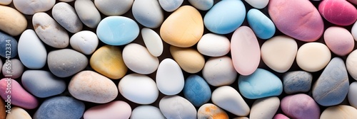 pastel colored pebble stones background. photo