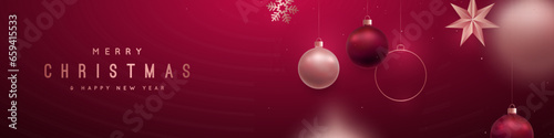 Merry Christmas greeting banner. Realistic Rose gold and Red Christmas balls, star and snowflake handing on Red background. Luxury horizontal backgdrop.