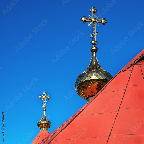General view and architectural details in close-up of the Orthodox Church of St. Luke the Apostle and Evangelist, built in 1944, in the town of Tyniewicze Duże in Podlasie, Poland.