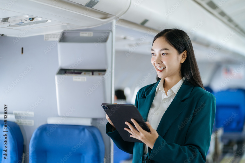 Woman working and update with calendar, schedule, timetable, and management, event planning sitting in airplane. Woman working and update with calendar, schedule, timetable, and management, event planning sitting in airplane.