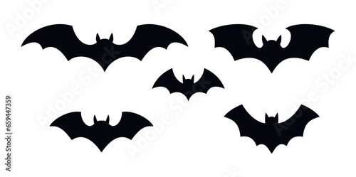 Set of black silhouettes of bats. Creepy decoration of horror design for Halloween party. Spooky background for october night party and invitations. Flat vector stock illustration