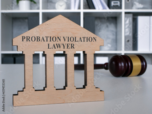 Desk with a plate probation violation lawyer. photo