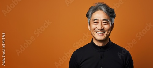 Mature Asian man smile happy face portrait photo