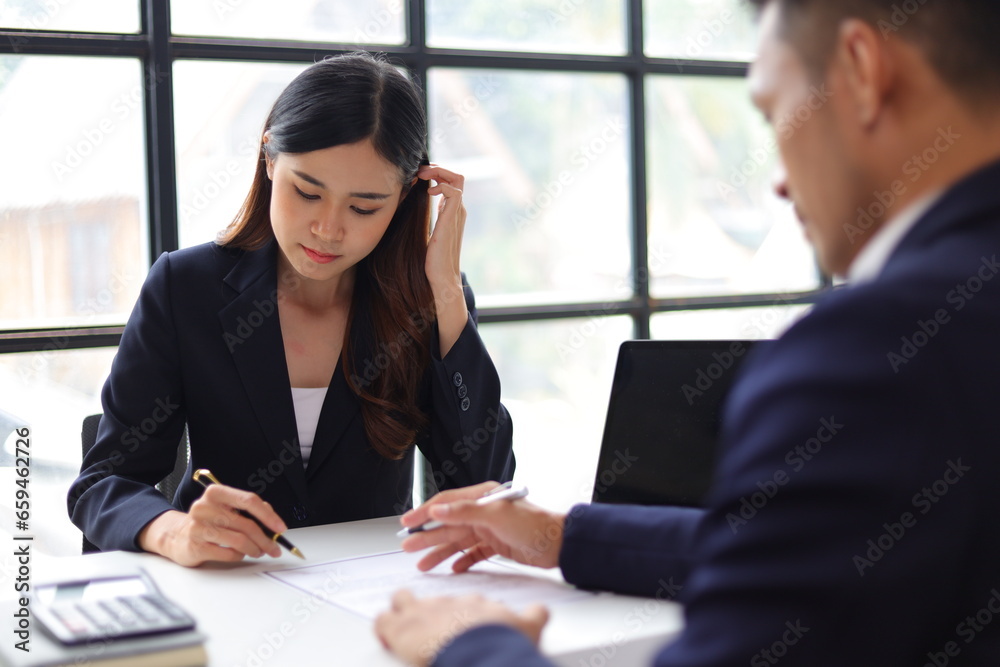 Manager reading resume while interviewing new employee candidates in office, job interview. - obrazy, fototapety, plakaty 