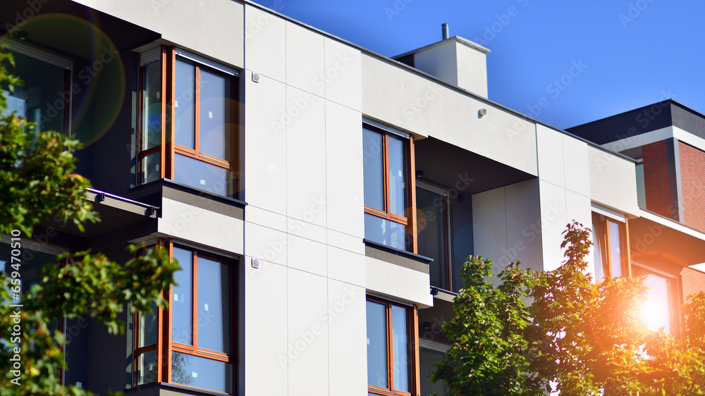 Green community. Eco apartment building saving energy and fresh air concept. Block of flats in beautiful green public Green community. Eco apartment building saving energy and fresh air concept. Block of flats in beautiful green public