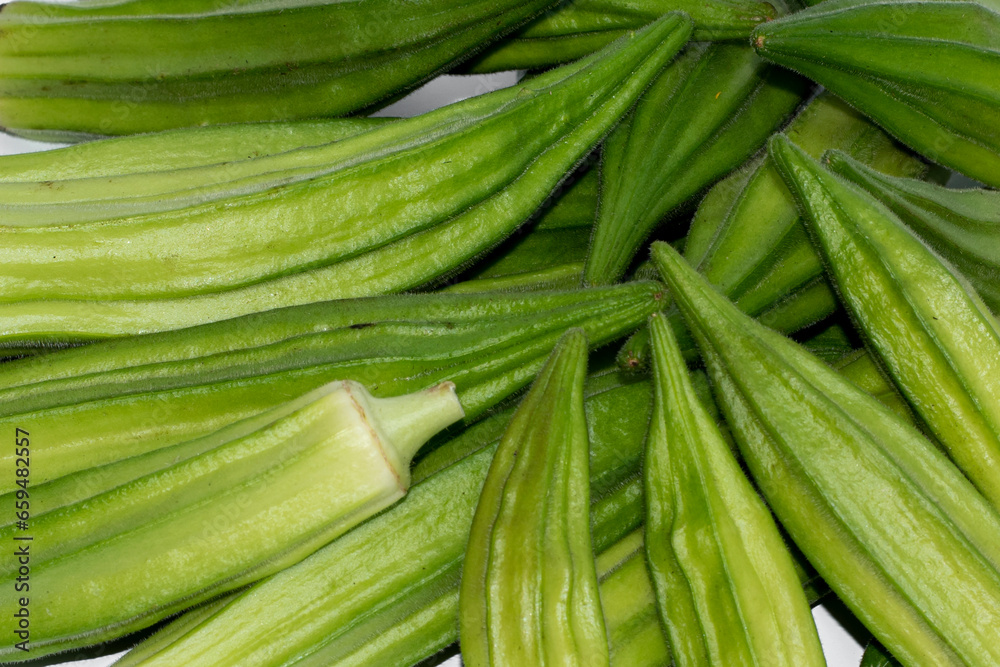 Fototapeta premium Fresh young Okra vegetable isolated on white background