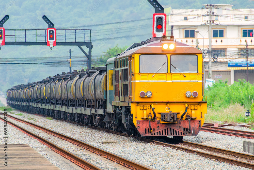 Obraz premium A crude oil freight train to the port from oil refinery.