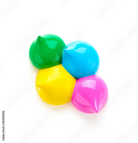 Paint pigment drops isolated on white background