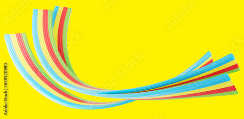 Set of colored jelly candy strips in sugar sprinkles isolated on white background. 3d illustration