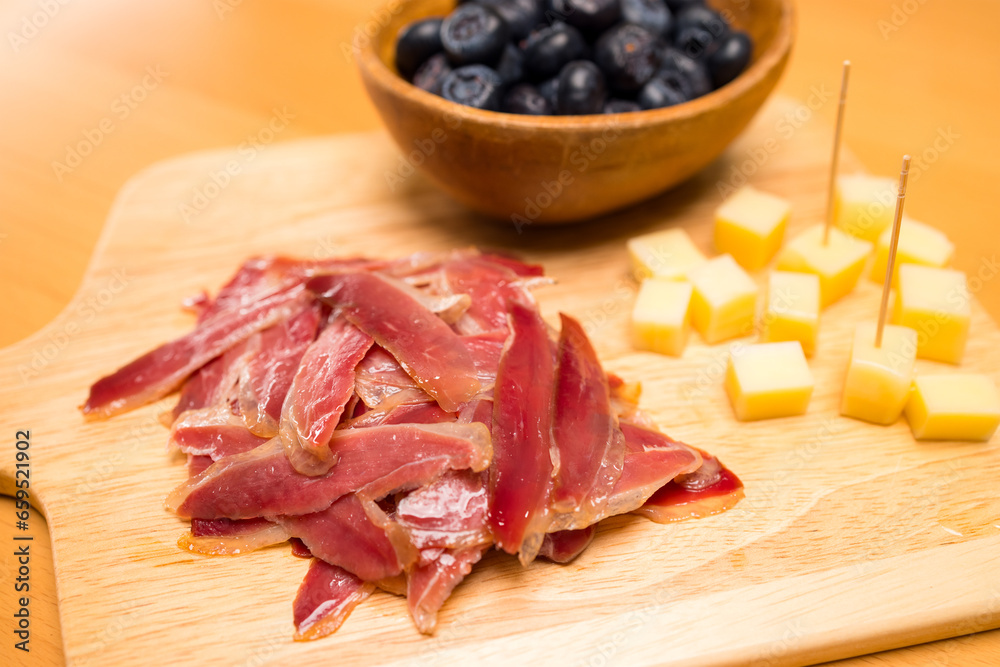 arrangement of delicatessen cold cuts with smoked ham
