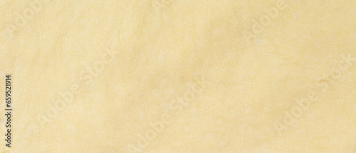 Φωτογραφία .Background of the dough for baking.