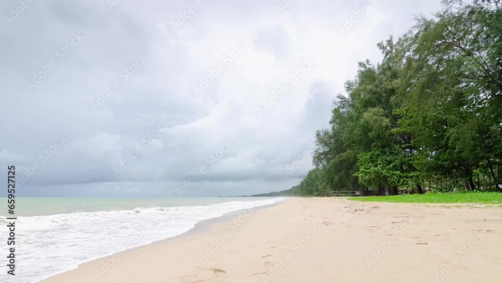 4K Time lapse of tropical sea beach landscape with sunset light of nature cloudscape sky and Clouds moving in raining season time 4K Time lapse of tropical sea beach landscape with sunset light of nature cloudscape sky and Clouds moving in raining season time