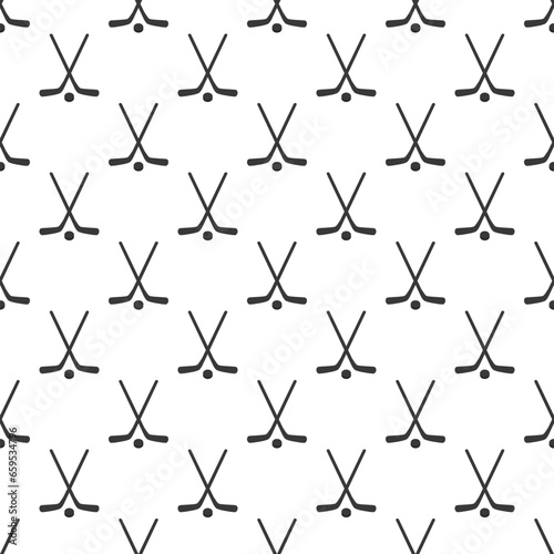 Ice hockey sticks and puck seamless pattern with simple sport symbols. Hockey vector print. Winter sporting repeated wallpaper for activity designs, fancier prints. Minimalistic style
