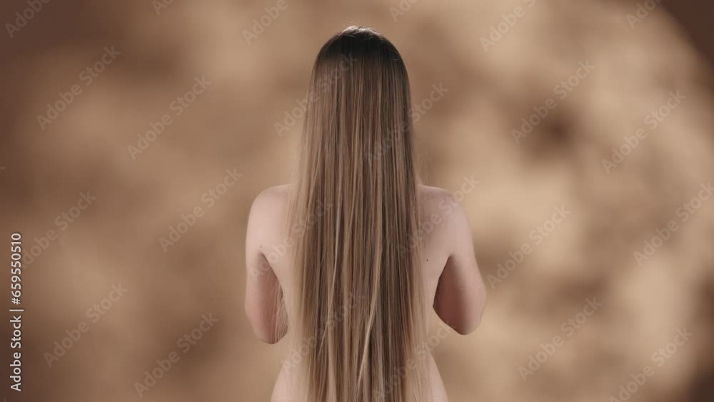 Framed against a blotchy background is a young woman with long and smooth white, russet hair. She is standing back with no outer clothing. Tosses her hair, it falls down her arms.