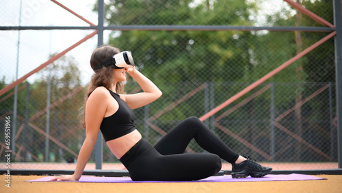 Woman in VR headset on a sports field