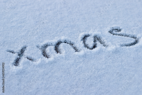 Inscription on the snow the word christmas © dwoow