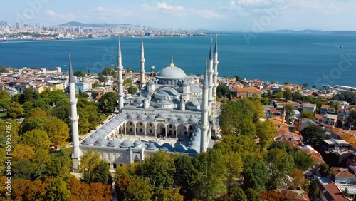 Hagia Sophia and Blue Mosque in Sultanahmet district of Istanbul, Turkey. Aerial view from drone. Suleymaniye Mosque is Ottoman imperial mosque in Istanbul, Turkey. It is largest mosque in city. photo