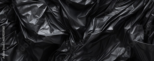 black crumpled plastic bag background