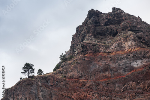 Dark landscape with coastal rocks of Madeira, Portugal