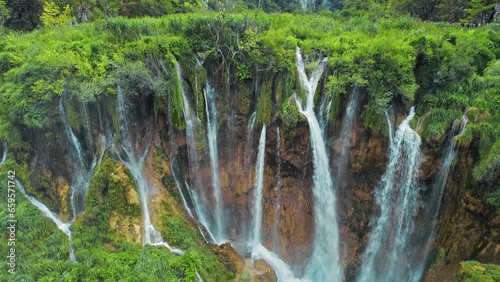 Waterfall in Plitvice Lakes in Croatia. A cascade of 16 lakes connected by waterfalls and a limestone canyon. The waters flowing over the chalk.