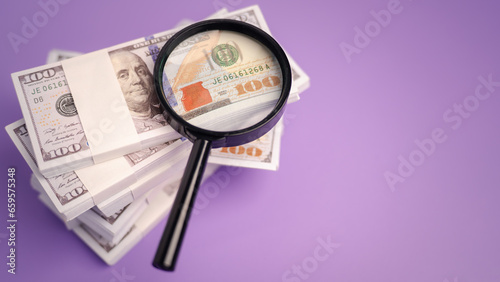 dollar cash magnifying glass concept , a money investment financial exchange currency business rich concept income, accounting, growing earning achievement fund management retirement.