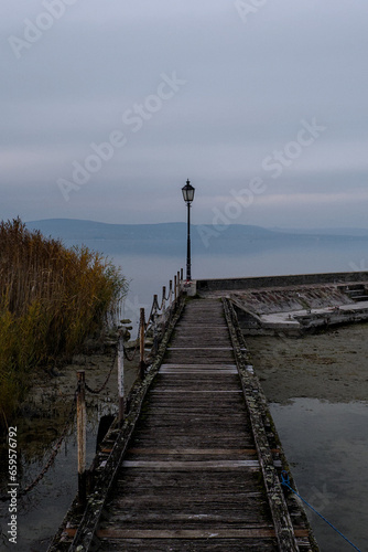 View pier with vintage lamp post at the Balaton lake
