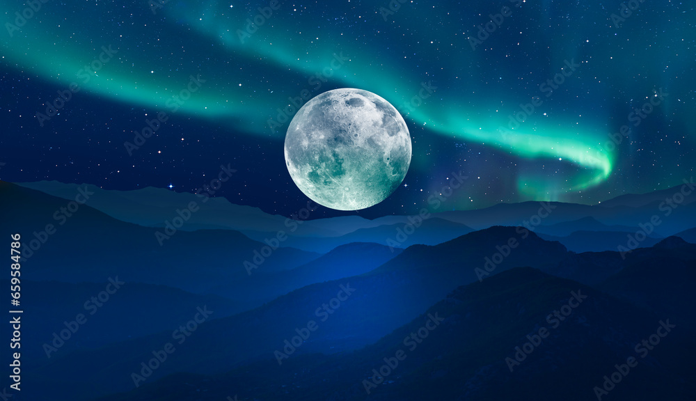Beautiful landscape with blue misty silhouettes of mountains - Northern lights (Aurora borealis) over the mountains with super full moon - 