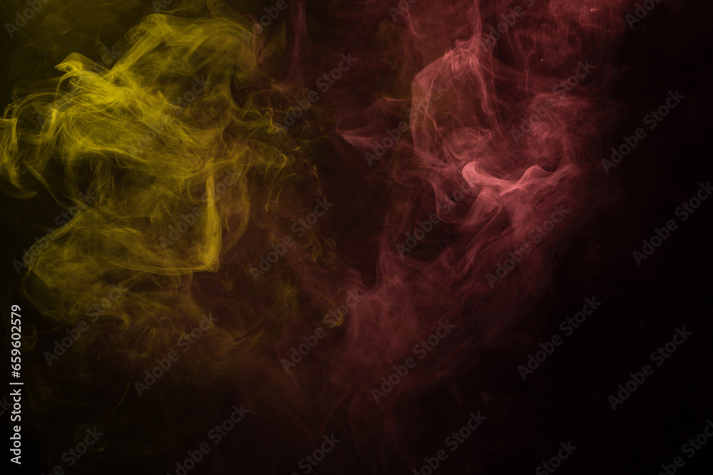 Yellow and pink steam on a black background.