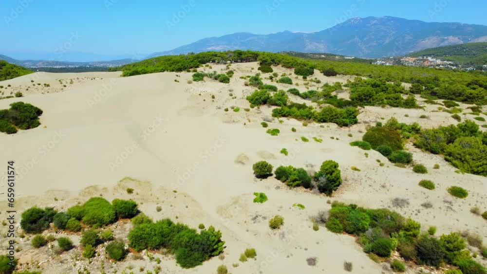 Beautiful Patara sandy beach with blue sea Kalkan, Antalya Turkey. Bird's-eye view from unmanned aerial vehicle over sandy beach, length of Mediterranean coast and longest sandy beach Beautiful Patara sandy beach with blue sea Kalkan, Antalya Turkey. Bird's-eye view from unmanned aerial vehicle over sandy beach, length of Mediterranean coast and longest sandy beach