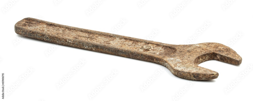 Old wrench on a white background