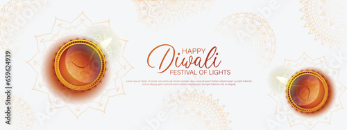 Happy Diwali - festival of lights colorful background with decorative diya lamp and rangoli.