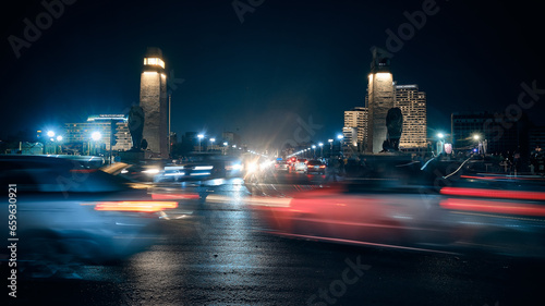 Cars driving on traffic ring near Qasr El Nil Bridge in Cairo, Egypt. Traffic in night Cairo © Philipp Berezhnoy