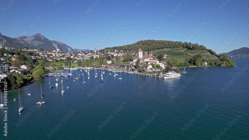 Aerial panorama of Spiez old town, castle and vineyards, Lake Thun, Switzerland. Aerial panorama of Spiez old town, castle and vineyards, Lake Thun, Switzerland.