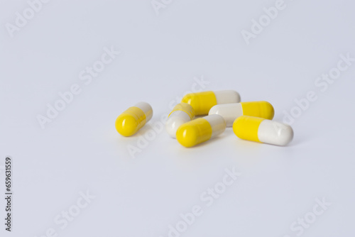 capsules on a white backgroun, medicine.