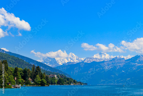 Fototapeta Naklejka Na Ścianę i Meble -  View of the Annecy lake surrounded by beautiful mountains in Annecy, France