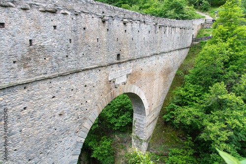 Roman aqueduct Pont d'Aël, Aosta Valley, Italy for water supply to Aosta (Inscription: bridge construction private initiative of Caius Avillius Caimus, from Patavium (Padova) around 3 B.C) photo