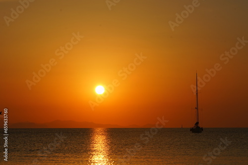 Boat at Sea During Sunrise © Federico