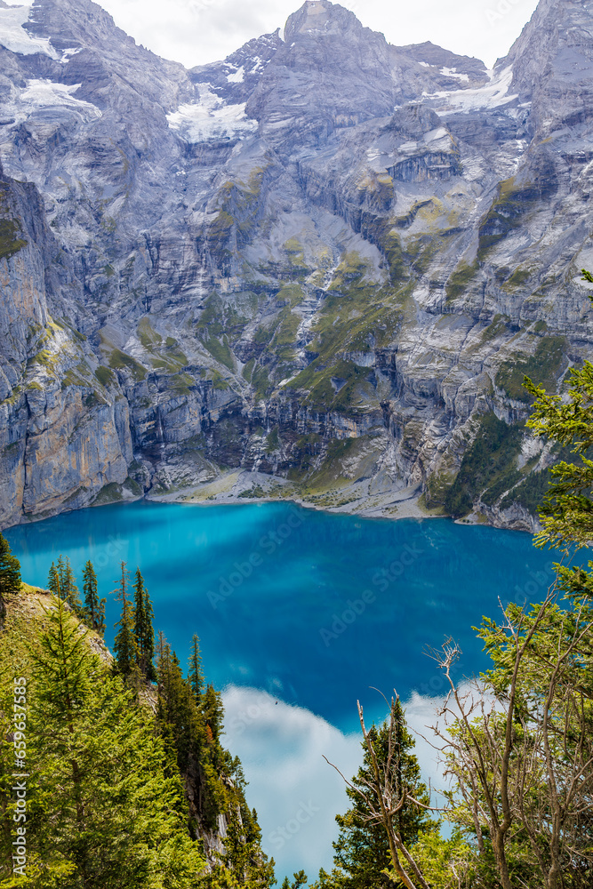 
Oeschinensee, often referred to as Oeschinen Lake, is a picturesque alpine lake nestled in the Swiss Alps.