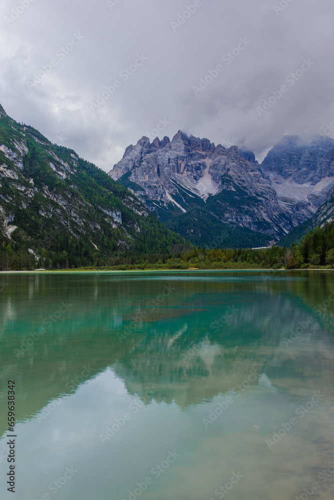 Lago di Braies, also known as Pragser Wildsee, is a breathtaking alpine lake nestled in the heart of the Dolomites, a UNESCO World Heritage site in northern Italy.