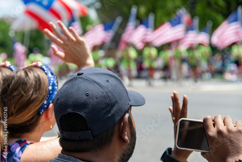 Принти на полотні Close up of the heads of two people watching the 4th of July parade in Washingto