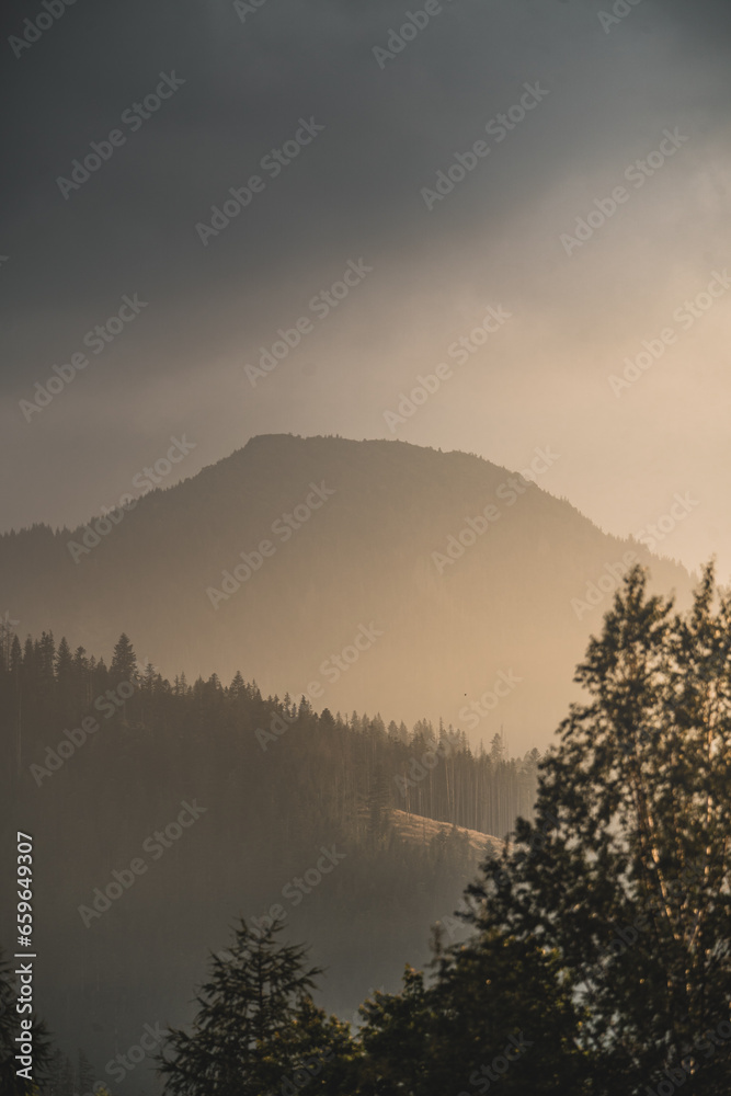 Mountain in fog with gentle light