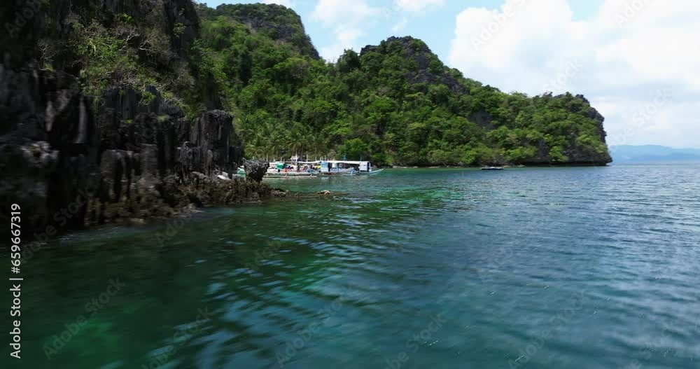 Drone view above the sea of an island in El Nido, Philippines Drone view above the sea of an island in El Nido, Philippines