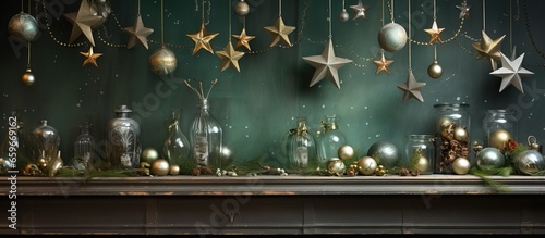 Vintage green ledge adorned with starry ornaments balls bows and bottles