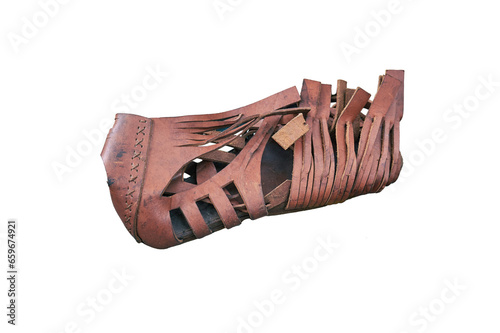 Ancient Roman leather sandal caligae, isolated on a white background. Reconstruction of military events during the wars of the Roman Empire photo