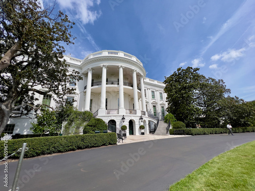 The sunny south side of the White House, where the President of the United States resides.Wide.