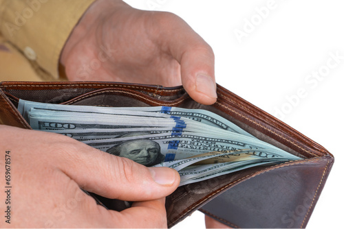 Man hands holding wallet with dollars, counting money. Allocation of money, economy concept, US dollar falling or rising. Finance, bank, currency