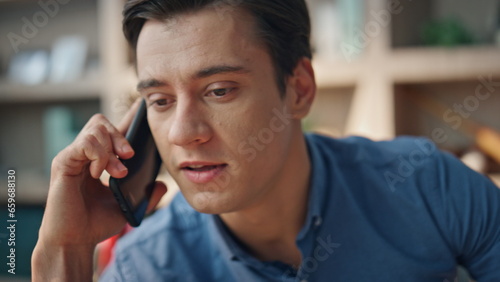 Nervous business man calling phone closeup. Freelancer ending bad conversation