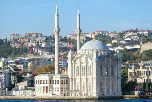 Ortakoy Mosque view from the sea in Istanbul. Religious mosque Ramadan month concept with building background.