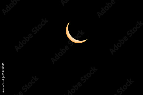 Solar Eclipse Crescent and Sun Spots